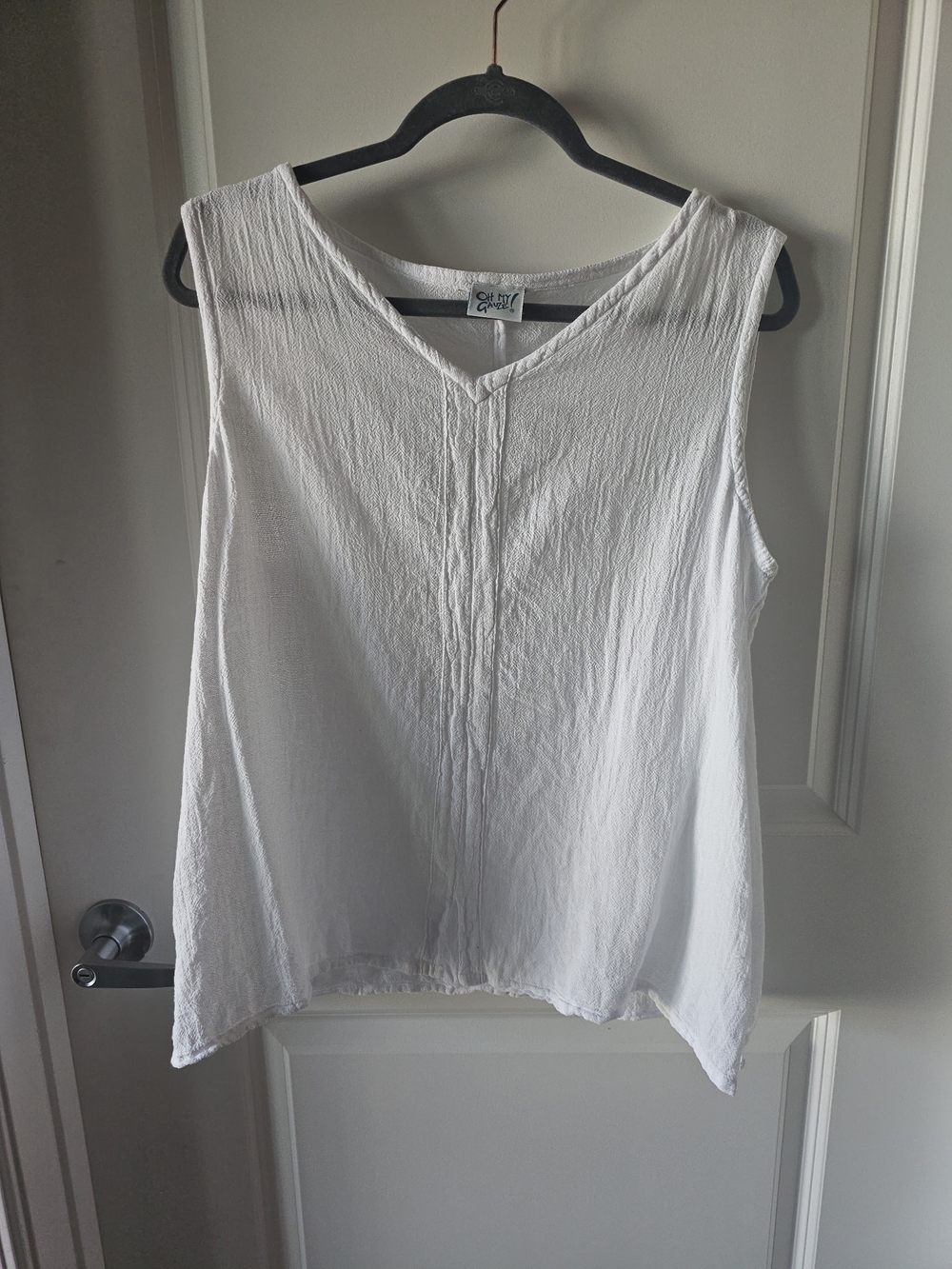 cut loose White Textured V-Neck Sleeveless Tank By Oh My Gauze.
